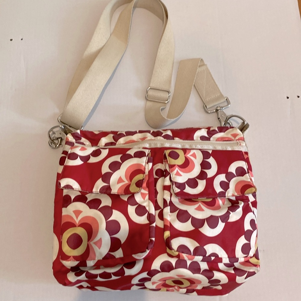 LE SPORTSAC Crossbody or Shoulder Adjustable Modern Floral Maroon Bag.